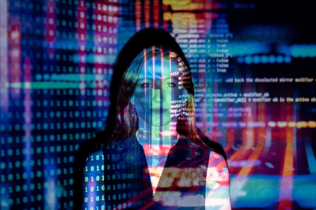 Woman surrounded by code